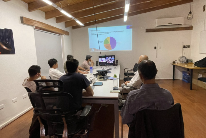 photo of a group of people at a meeting